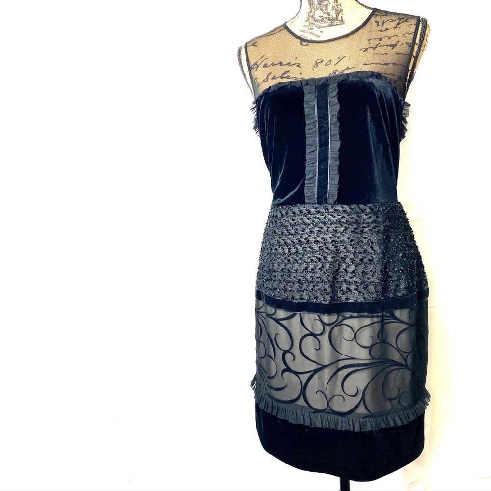 SL Fashions beautifully detailed lil black dress.